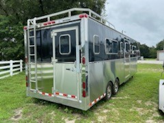 1995 Pegasus (5) horse head to head trailer with an interior height at 8’ tall x 8’ wide, enclosed storage space over nose, rubber lined walls, rubber mats over wood floor, side ramp with dutch door, curbside escape door, insulated roof and a rear tack compartment with a rear access door and two access doors into the horse area.   This trailer has been completely restored this year and is ready for the horse shows! 