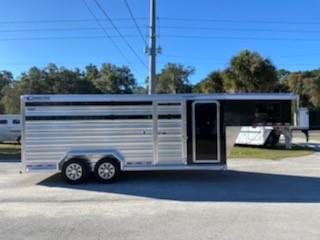 2022 Cimarron 16’ Lonestar 24’ stock trailer with a 4’ tack room that has saddle racks, bridle hooks, brush box, camper door and a walk thru door into the stock area.  In the stock area you have an interior height at 7’ 1” tall x 6’ 10” wide, escape door, water tank, full swinging center gate, rubber mats over all aluminum floor and a full swinging rear door!  The exterior has a hydraulic jack, two 7000lbs axles, aluminum wheels and a spare tire.  