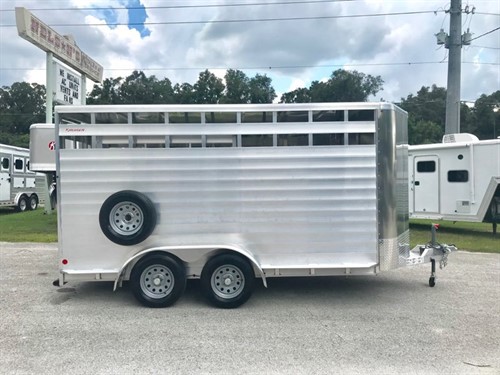 (On Order) 2022 Kiefer 16' stock bumper pull trailer with an interior height at 7' tall x 7' wide x 16' long, escape door, full swinging center gate, rubber mats over all aluminum floor and a full swinging rear door with a half slider!  The exterior has two 3500lbs axles, spare tire and weighs 2500lbs.