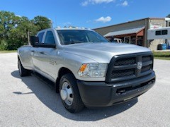 2014 Dodge Ram 3500 Diesel Super Cab Dually Truck with 128,000 Miles, automatic transmission, with lots of extra options on it like, extra auxiliary LED lights at the front and rear of truck, air bags, auxiliary 40 gallon fuel tank with auto fill, both fifth wheel and gooseneck connections, and pre wired for multi camera systems!  One owner, super clean!   No Trades, Consignment Trailer.  